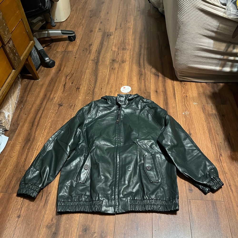 Woman’s dark green Jacket